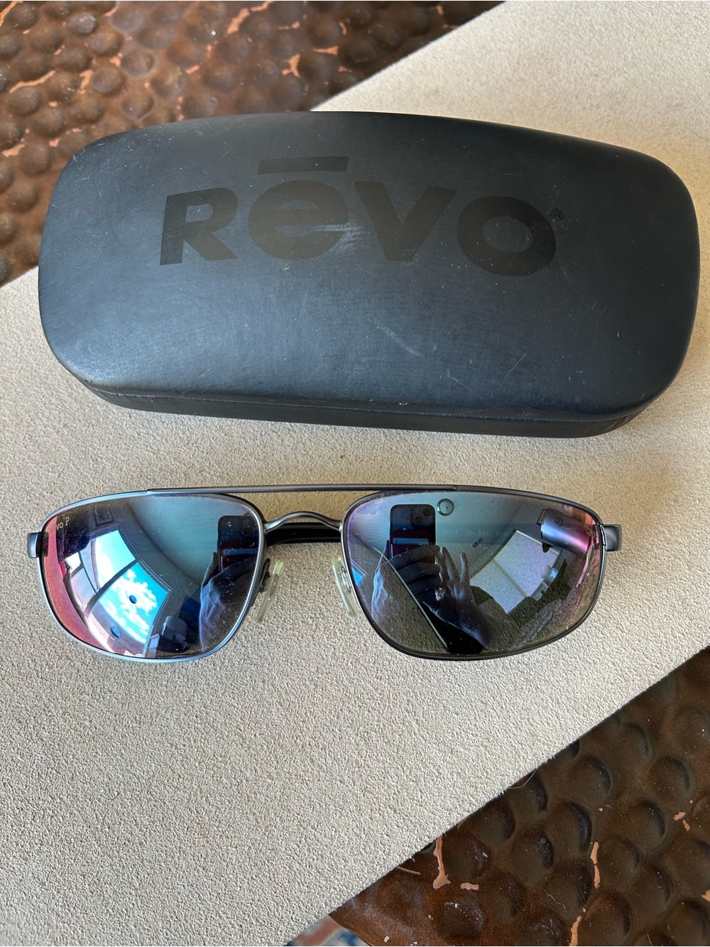 Revo Polarized Sunglasses — Black Frame with Blue Logo